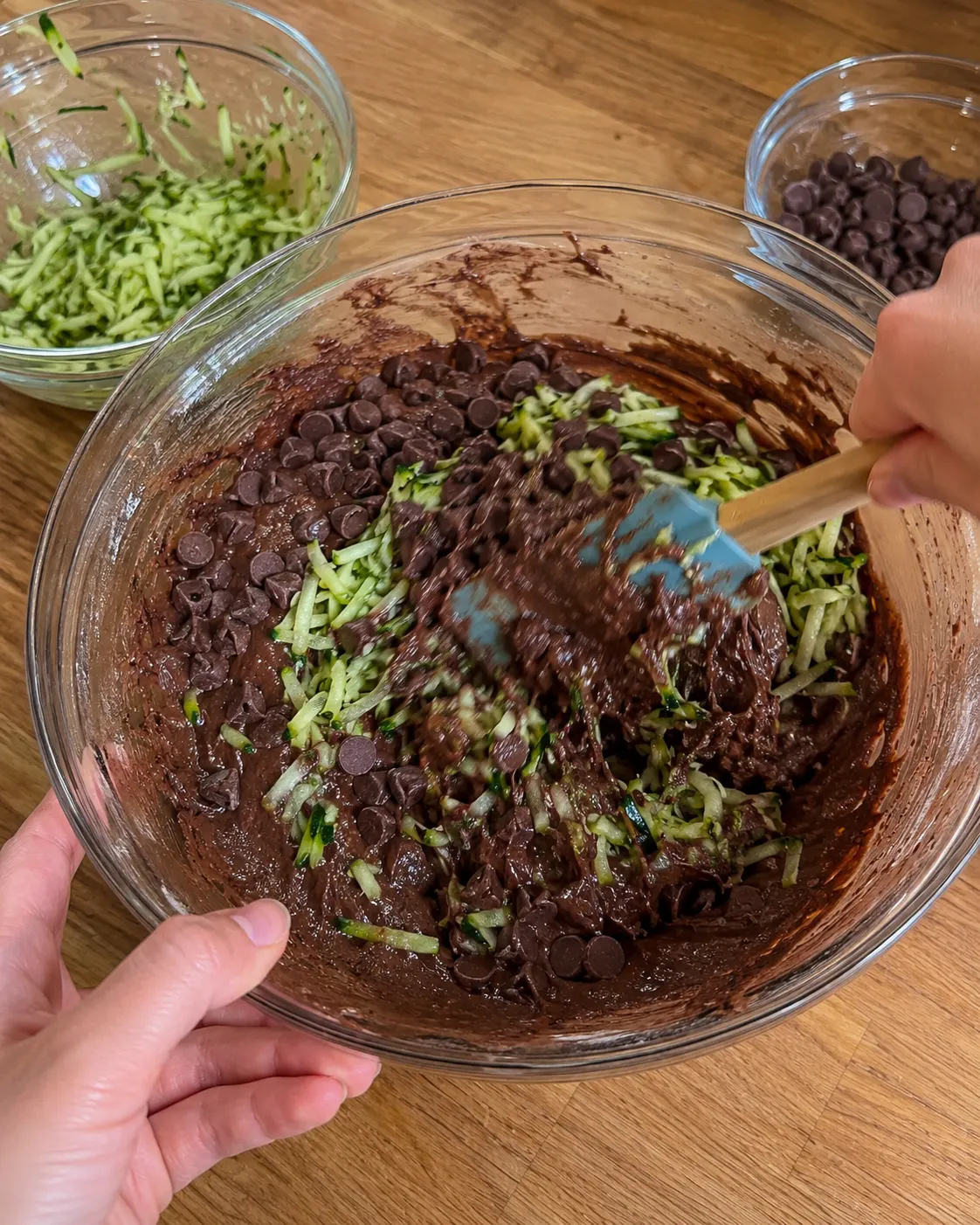 Shredded zucchini and chocolate chips folded into Chocolate Zucchini Bread batter