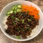 Korean Ground Beef Bowl served with fluffy white rice and fresh vegetables