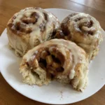 Homemade Apple Cinnamon Rolls showing the soft apple cinnamon spiral