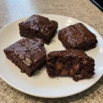 Homemade chocolate zucchini brownies with melted semisweet chocolate chips