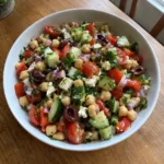 Mediterranean Chickpea Salad recipe with chickpeas, cucumber, tomatoes, feta, and olives