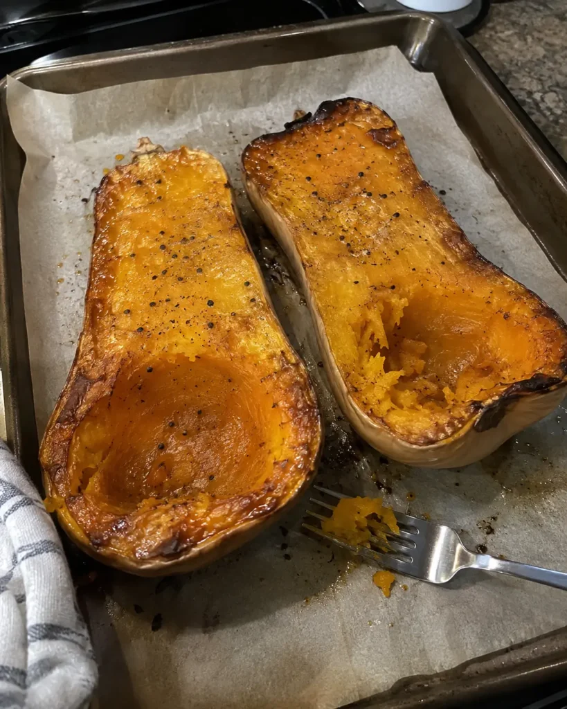 roasted butternut squash halves before blending into soup