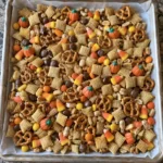 Overhead Sweet and Salty Fall Snack Mix on a parchment-lined baking sheet